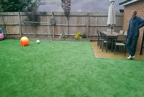 An artificial lawn before Willow Landscapes work