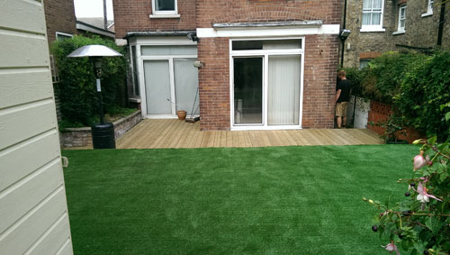 An artificial lawn before Willow Landscapes work