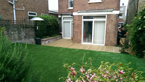 An artificial lawn before Willow Landscapes work